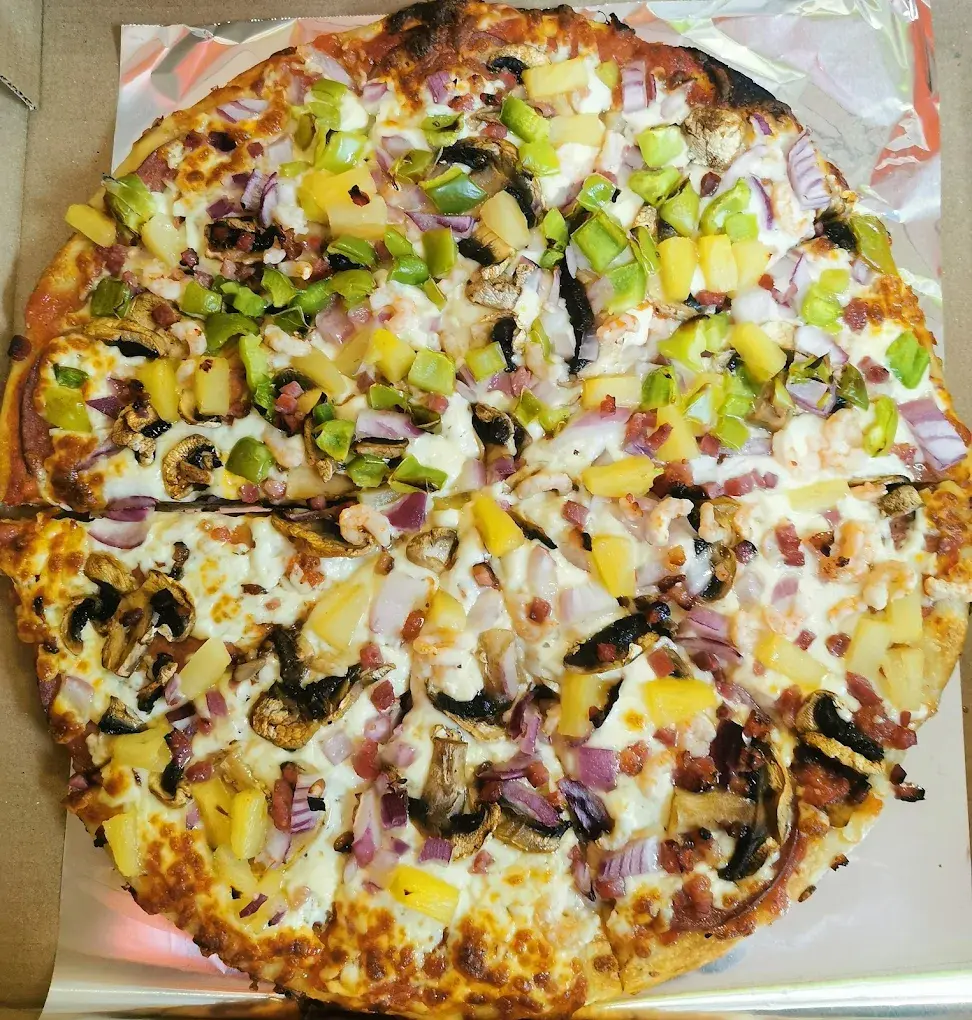 Experience authentic pizza and donair at Jimmy's Place in Edmonton