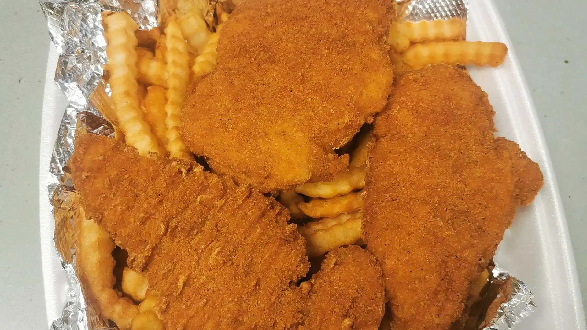 Chicken Fingers with Fries at Jimmy's Place in Edmonton, AB